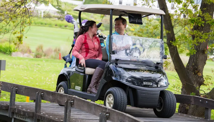 Golf cart on bridge